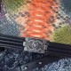 Chanel A67086-python-4 Medium Boy Flap Bag in Black/Orange Aged RHW 